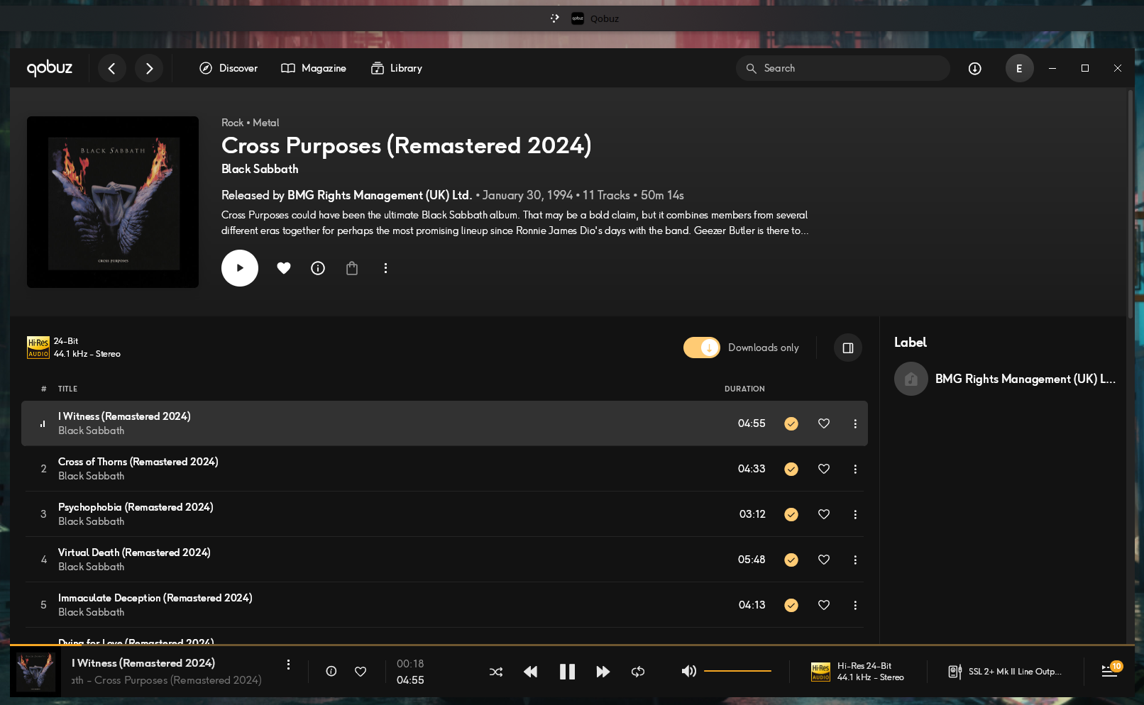 The Cross Purposes album page in the Qobuz app under CrossOver, with the Hi-Res 24-Bit 44.1 kHz badge, the Downloads only toggle enabled and the tracks marked with the completed download icon